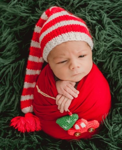 Newborn baby boy studio portrait