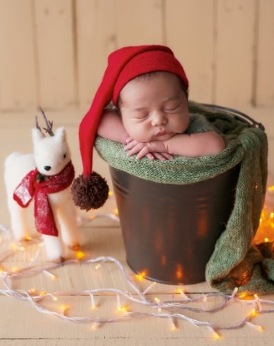 Sleeping newborn santa baby. Healthy child and happy motherhood. Happy pregnancy and childbirth